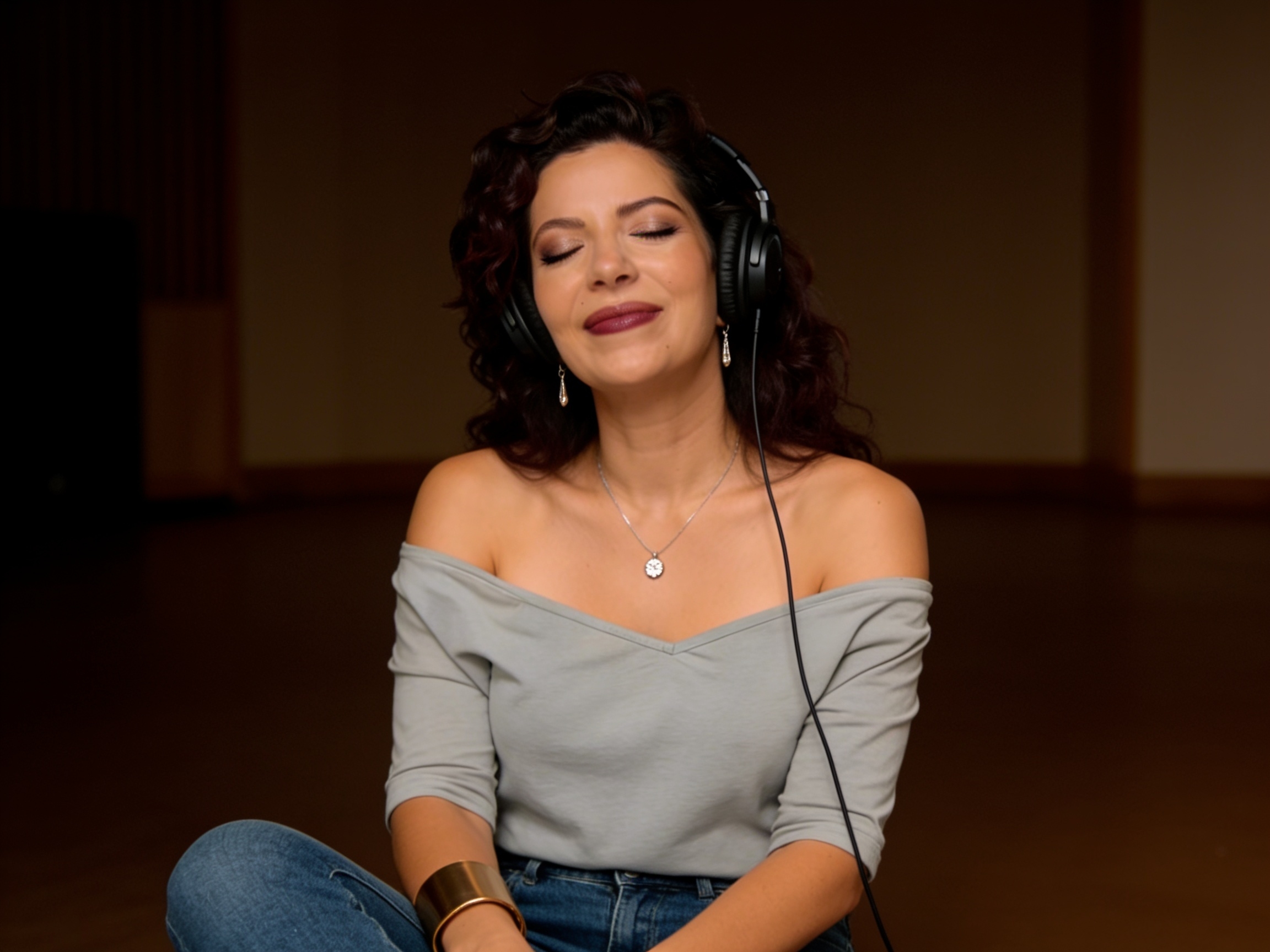 Lioness Zen listening to music with headphones